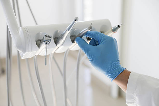 Professional Invisalign Clear Aligners technician working in Greenport West, NY